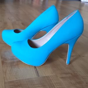 Teal colored stiletto pump heels